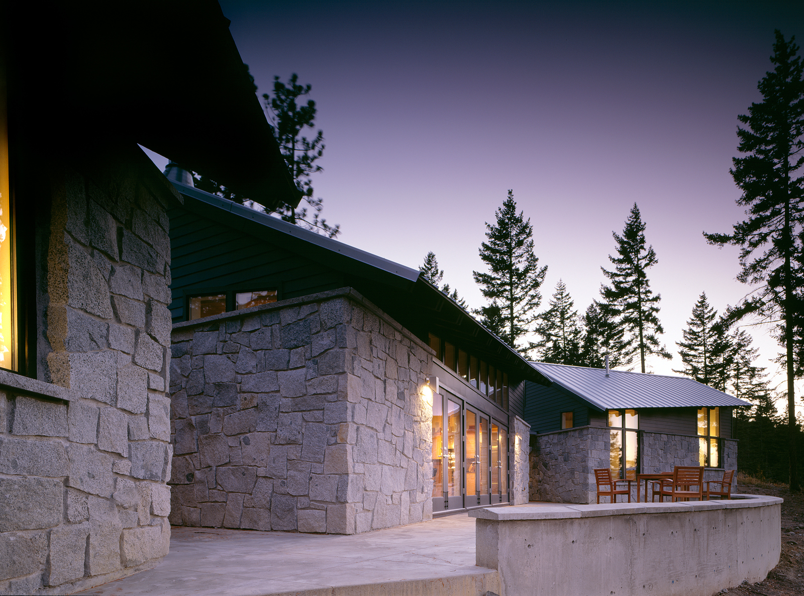 320 Palouse stone exterior at dusk — photo by Benjamin Benschneider